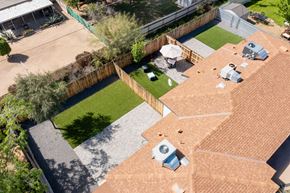Phoenix apartment for rent - A backyard with a patio and a fence.